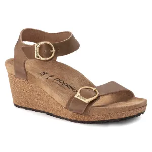 Certainly! Heres an optimized title for the product:

Birkenstock Papillio Soley Womens Wedge Sandals in Cognac Oiled Leather

This title includes key modifiers and details about the product.