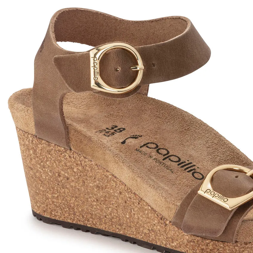 Certainly! Heres an optimized title for the product:

Birkenstock Papillio Soley Womens Wedge Sandals in Cognac Oiled Leather

This title includes key modifiers and details about the product.